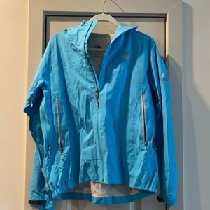 Never worn north face rain/wind breaker!